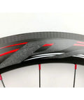 Close-up of 700C Road Carbon Fiber Fat Ring Disc Brake Wheel Set rim with red accents and UD matte finish