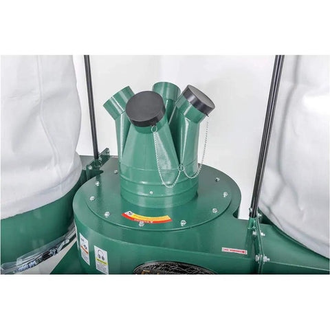 Shop Tough Five Horsepower Industrial Dust Collector Kicking Serious Dust With Giant Fifteen Inch Impeller And Four Quick Connect Ports for effective airflow.
