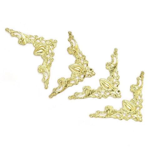 Top Shelf Iron Corner Protectors Sweet Yellow Edge Guards For Books Scrapbooks And Purse Cases, ornate golden metal design.