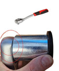 Close-up of hand holding Beefy Middle Drive Gear Nut Wrench Tool for ATV UTV, showcasing metal finish and design
