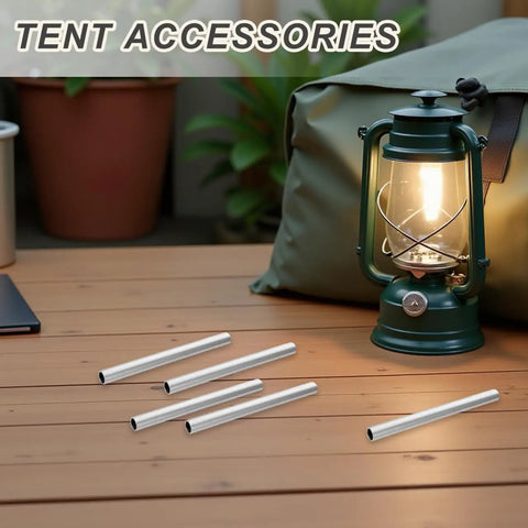 Five Pack Aluminum Tent Pole Repair Sleeves Replacement Connectors for Camping Poles on wooden table near lantern