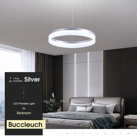 Sleek Modern LED Chandelier Round Pendant Light 19.7 Inch Dimmable Ceiling Light displayed above a modern bedroom