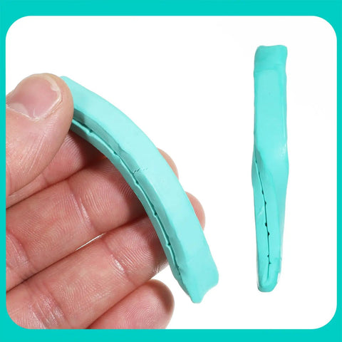 Pro Grade Watch Cleaning Putty Kit For Precision Movement Cleanup and Dial Dust Removal in hand with willow sticks and adhesive tools