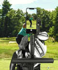 Rocker Solid Electric Golf Push Cart With Remote Control And Dual High Torque Motors For Easy Slope Management, phone holder displaying golfer.