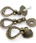 Set Of 4 Vintage Antique Brass Pendant Ring Pull Handles With Single Mounting Hole for drawers, close-up view showing screw detail.