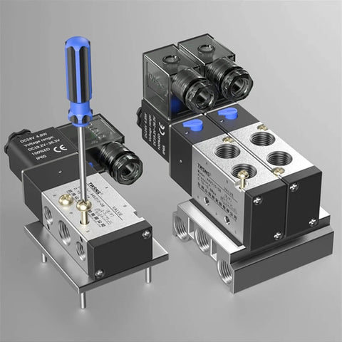 12 Volt One Eighth Inch Solenoid Valve for pneumatic systems with screwdriver for assembly, 3 Way Pneumatic Air Control Valve shown in metal and plastic build.