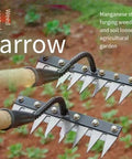 Heavy Duty Carbon Steel Weeding Rake With 7 Teeth For Garden Weeding And Soil Prep Durable Triple Welded Yard Tool in use over soil