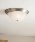 Three Light Flush Mount Ceiling Light in Brushed Nickel With Clear Satin Etched Glass, 15.25 Inch Wide, installed on ceiling