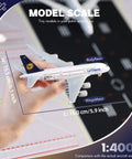 Holding 1/400 Scale Airbus A380 Model With Detachable Landing Gear And Display Stand, compact 6-inch plane model.