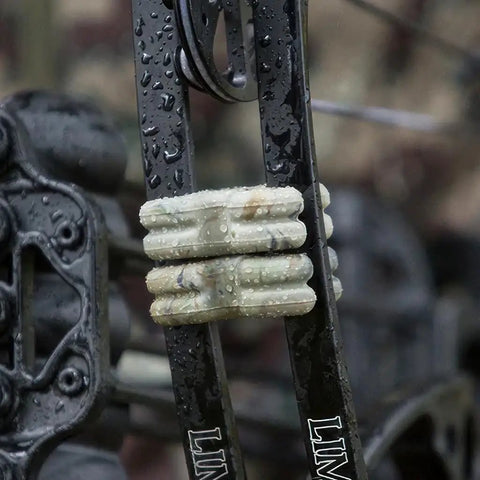 TwistLox Dampener For Split Limb Bows Purple, Cuts Noise And Vibration, Easy Slide In Twist Lock on a rain-soaked bow.
