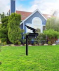 Solar Motion Sensor Flood Light With 8 LEDs And 500 Lumen Output For Garage Yard Driveway Pathway installed in garden
