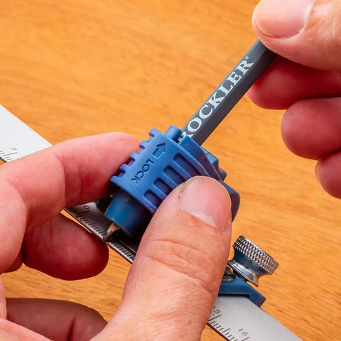 Hands using 9 Inch Quick Draw Marking Gauge For One Hand Operation With Spring Loaded Pencil Carriage And Dovetail Keyway on wood surface