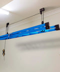 Ceiling Mount Bike Hoist Set Of 2 With Pulley System And Bike Hangers Easy Overhead Storage For Garage Or Workshop Holds Up To 55 Lbs Each Heavy Duty Rope Smooth Operation Space Saving, blue hoist mounted on ceiling