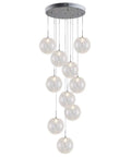 Sleek Modern Stair Chandelier Featuring Glowing Round Glass Balls And White Metal Frame For Dramatic Ceiling Pendant Lighting That Drops Major Vibes In Your Living Room Or Hallway Setup.