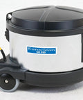 Professional Grade Heavy Duty Canister Vacuum With Smooth Suction Power And Dead Silent Motor Featuring Certified HEPA Filters Plus Zero Fuss Cord Swap For Easy Daily Cleanup, silver and black design, corner view.