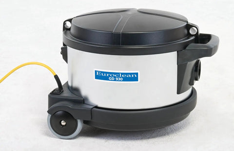 Professional Grade Heavy Duty Canister Vacuum With Smooth Suction Power And Dead Silent Motor Featuring Certified HEPA Filters Plus Zero Fuss Cord Swap For Easy Daily Cleanup, silver and black design, corner view.
