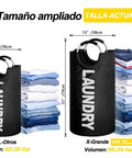 X Large 115L Collapsible Laundry Basket Stand Up Hamper Two Pack Black And Dark Grey With Padded Handles Foldable Dirty Clothes Organizer For Home Laundry Storage next to folded clothes.