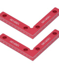 Sturdy Right Angle Clamps 2 Pack Aluminum Alloy Positioning Tools For Woodworking And Crafts To Make Perfect Square Corners Every Time With Clear Red Measurement Scale For Pros Who Need Reliable Balance And Precision On The Job Site Now. Two red aluminum alloy clamps with measurement markings.