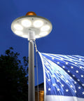 Solar Flag Pole Light With 136 LEDs Dusk To Dawn Auto On Off Sensor illuminating flagpole and flag at night
