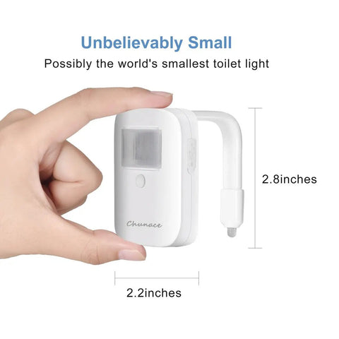 Hand holding rechargeable toilet night light with motion activated sensor, 2.2 x 2.8 inches, perfect gift idea for 2025