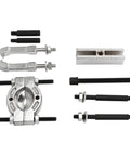Thinking Process: 9-piece steel bearing splitter puller kit with threaded bolts for removing hubs, bearings, gears, and shafts