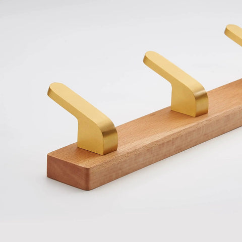 No Fuss Brass Wall Mount Coat Hooks Durable Entryway Hanger Rack with three curved hooks on wooden base.