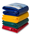 Stack of colorful vinyl tarps includes heavy duty waterproof vinyl tarp with rustproof grommets for truck covers and construction work.