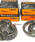 Timken taper roller bearing replacement set for 7000-lb trailer axle; four boxes and two bearing assemblies visible.