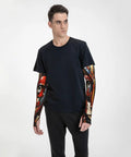 Snag These Fly Ice Silk Arm Sleeves With Cute Cat Graphics And Grippy Thumb Holes Offering Ultra Cool UV Shielding For Hot Days Of Running Cycling Or Driving on a model wearing a black shirt.