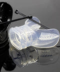 Two Pack Transparent Silicone Long Replacement Mouthpieces For Snorkel And Dive Gear Super Comfy Fit Universal Mouthpiece For Snorkeling Diving And Water Sports on reflective surface with black clasp
