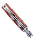 Framelock Folding Knife Kit FLX25 with cocobolo dymondwood handles, side view showing folded blade and frame design