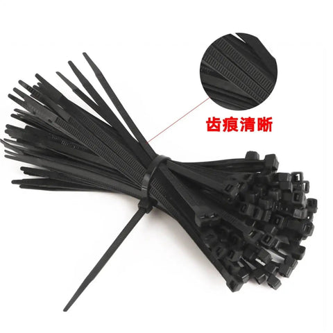 Nylon Cable Tie Set Self Locking Plastic Wire Ties 100 Pcs Heavy Duty bundle in black, close-up of locking mechanism shown.
