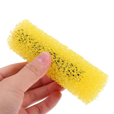 Forty Heavy Duty Paint Texture Sponge Rollers For Nailing Perfect Embossed Wall Finishes On Gnarly Surfaces With An Elastic Grip, yellow sponge roller held in hand.