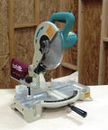 10 Inch 15 Amp Compound Miter Saw With Beefy 4600 RPM Motor, viewed from the side, featuring a dual post arm and smooth cutting table.