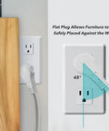 6 Ft 3-Outlet Heavy Duty Flat Plug Extension Cord 14-3 SJT White Grounded in wall outlet, showing 45-degree angle for furniture placement