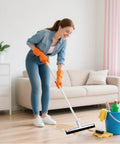 Woman using Six Pack 18 Inch Double Foam Floor Squeegee with EVA Foam Blade for Quick Cleanups on wooden floor indoors