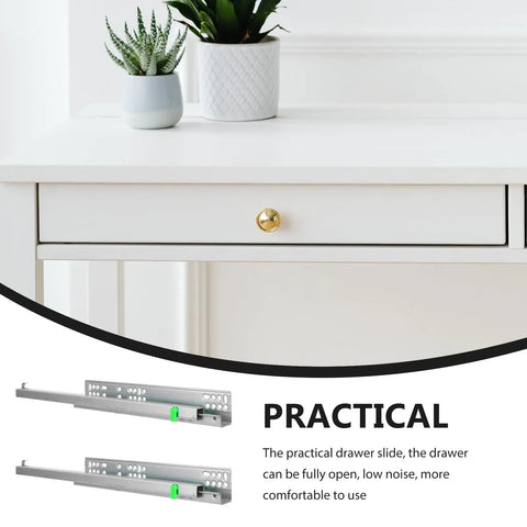 16 Inch Detachable Slow-Close Drawer Slides with Metal Rails beside white cabinet with drawer, plant on top.