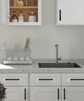 Modern kitchen with Matte Black Cabinet Pulls 10 Pack 5 Inch 128mm Hole Centers Aluminum Handles on white cabinets.