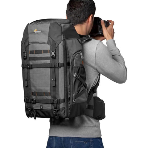 Pro Trekker BP 550 AW II 40L Camera Backpack for Pro Gear, Rugged, Weatherproof and Durable, worn by a photographer