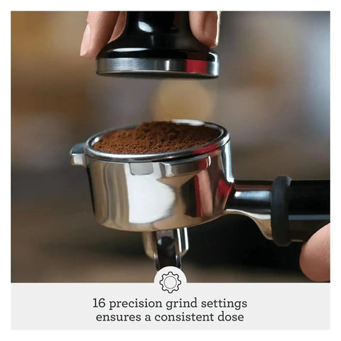 Close-up of espresso tamper and portafilter with ground coffee for Smart Home Espresso Maker For Barista Level Espresso At Home With Programmable Brew Custom Strength Quick Heat And Compact Black Sesame Design That Fits Small Kitchens And Tiny Countertops.