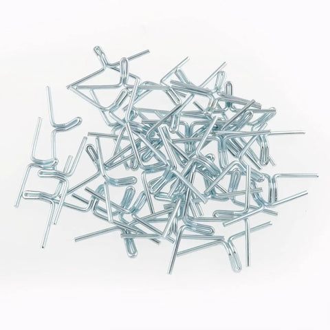 Fifty Piece Spring Steel Lawn Chair Webbing Clips in a pile, durable metal hooks for patio furniture repair.
