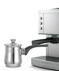 6 Ounce Turkish Coffee Pot With Lid Stainless Steel Saucepan Coffee Maker next to a silver espresso machine