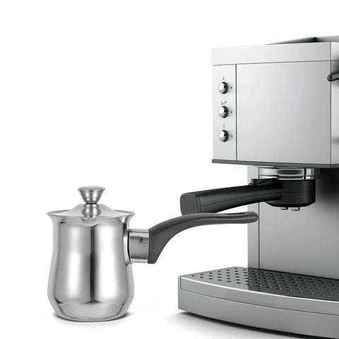 6 Ounce Turkish Coffee Pot With Lid Stainless Steel Saucepan Coffee Maker next to a silver espresso machine