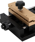 Close-up of adjustable aluminum alloy fixture for laser cutting and marking on metal sheets, 4.72 by 4.72 inch clamping range.