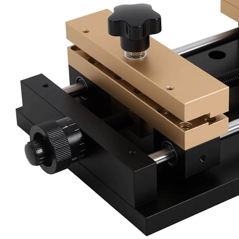 Close-up of adjustable aluminum alloy fixture for laser cutting and marking on metal sheets, 4.72 by 4.72 inch clamping range.