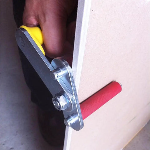 Heavy Duty Gypsum Board Lifter Portable Drywall Carrying Tool With Alloy And Rubber Handles gripping a gypsum board edge.