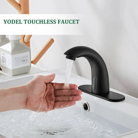 Touchless Bathroom Sink Faucet Matte Black With Automatic Sensor And Hands Free Water Saving Fixture For Commercial Use Battery Or 110V AC Powered 1 Or 3 Hole Installation in use, water flowing over hand