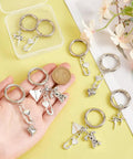 Fresh Safety Pin Shoe Charms With Sturdy Spring Clips And Alloy Badges Featuring Star Heart Rabbit Designs For Boots Bags And Purse Gear That Bring Serious Vintage Vibes And Always Deliver The Goods, displayed on a hand.