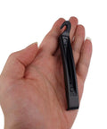 Hand holding bike tire lever from Eight Pack Bike Rim Tape And Three Tire Levers Kit For 26 Inch Or 700C Rims