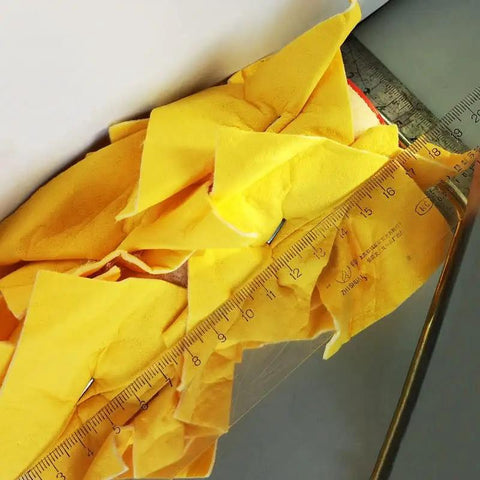 7 Inch Texture Rollers For Dead Simple Wall Makeovers With Dinosaur Doodle Design High Density Non Woven Microfiber Cover No Sweat Paintbrushes For Quick Diy Home Projects alongside measuring ruler and yellow fabric.